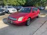 2009 RED FORD FUSION SE (3FAHP071X9R) with an 3.0L engine, Automatic transmission, located at 1708 Broadway, Rockford, IL, 61104, (815) 397-5010, 42.252522, -89.069359 - Photo#0