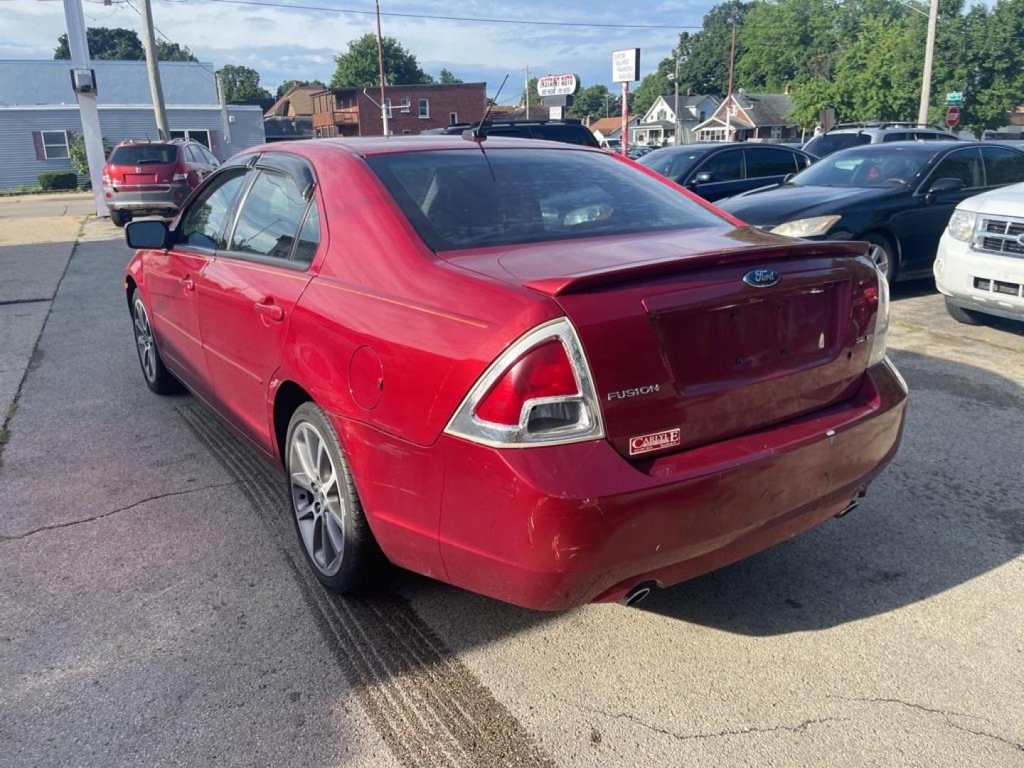 2009 RED FORD FUSION SE (3FAHP071X9R) with an 3.0L engine, Automatic transmission, located at 1708 Broadway, Rockford, IL, 61104, (815) 397-5010, 42.252522, -89.069359 - Photo#3