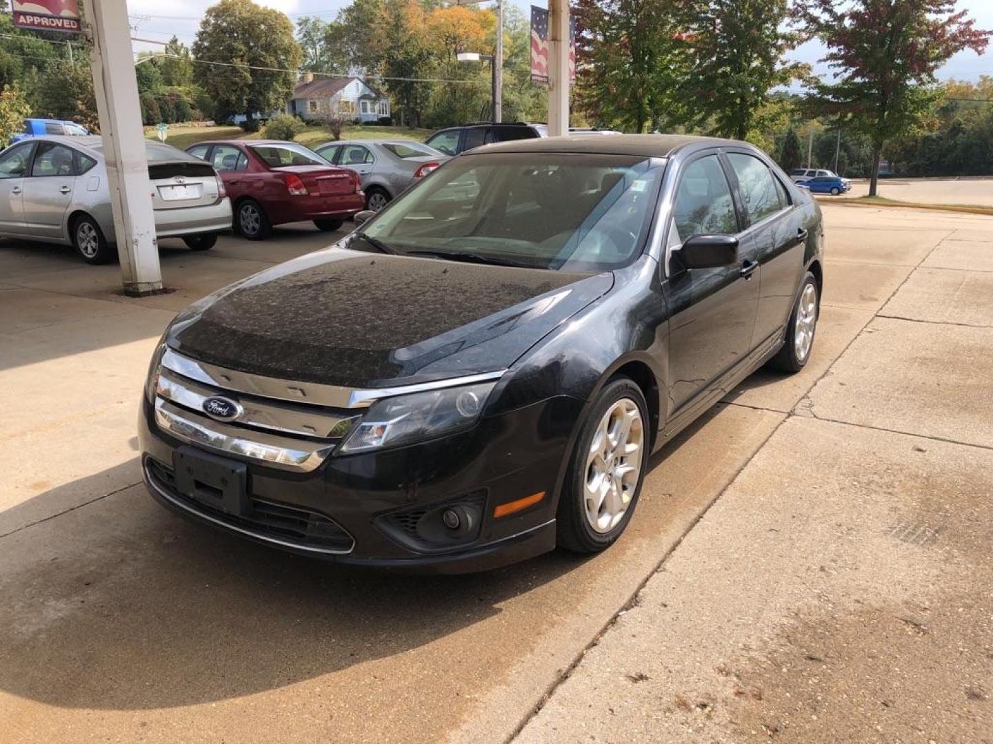 2010 BLACK FORD FUSION SE (3FAHP0HA3AR) with an 2.5L engine, Automatic transmission, located at 1708 Broadway, Rockford, IL, 61104, (815) 397-5010, 42.252522, -89.069359 - Photo#0