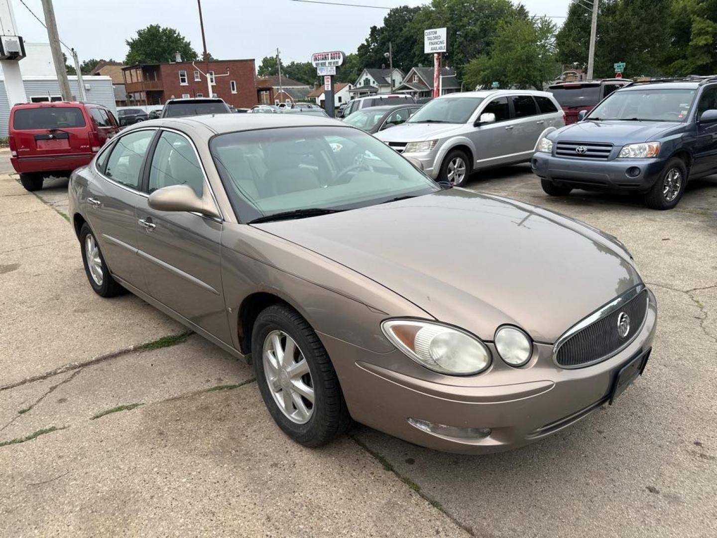 2006 GOLD BUICK LACROSSE CXL (2G4WD582561) with an 3.8L engine, Automatic transmission, located at 1708 Broadway, Rockford, IL, 61104, (815) 397-5010, 42.252522, -89.069359 - Photo#3