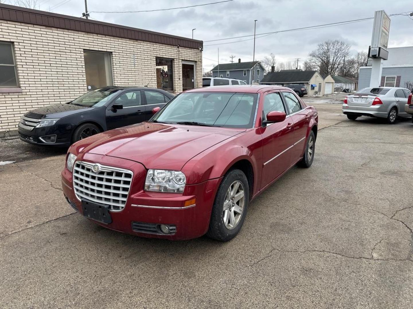 2007 RED CHRYSLER 300 TOURING (2C3KA53GX7H) with an 3.5L engine, Automatic transmission, located at 1708 Broadway, Rockford, IL, 61104, (815) 397-5010, 42.252522, -89.069359 - Photo#0