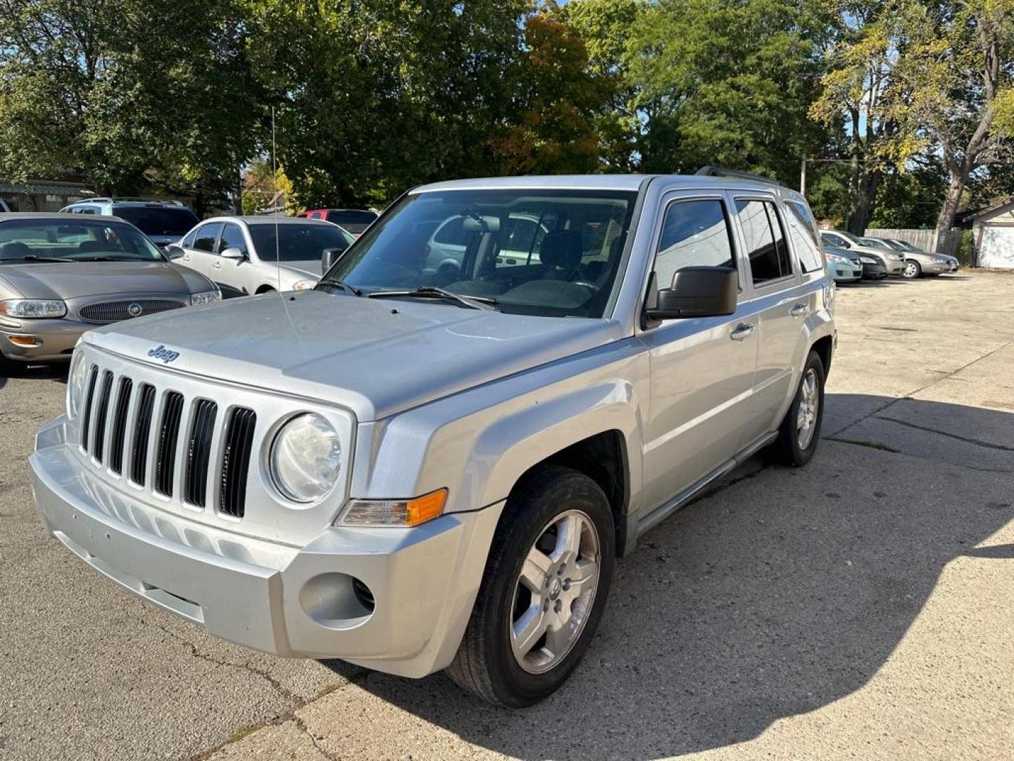 2010 SILVER JEEP PATRIOT SPORT (1J4NT2GA2AD) with an 2.0L engine, Continuously Variable transmission, located at 1708 Broadway, Rockford, IL, 61104, (815) 397-5010, 42.252522, -89.069359 - Photo#0