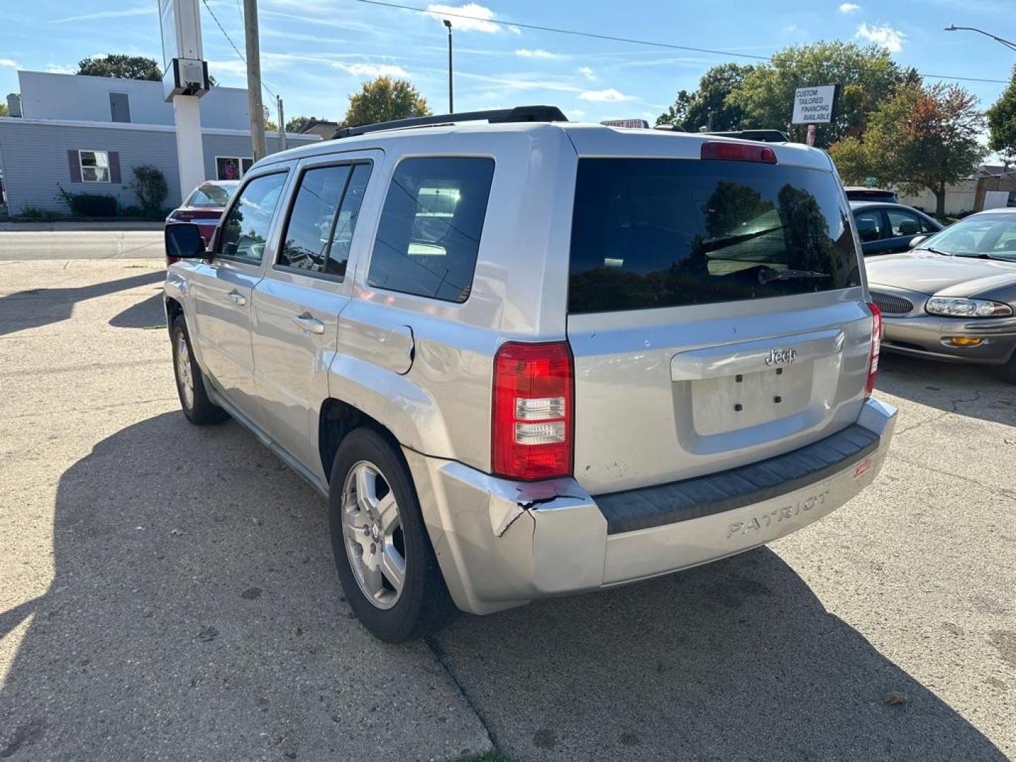 2010 SILVER JEEP PATRIOT SPORT (1J4NT2GA2AD) with an 2.0L engine, Continuously Variable transmission, located at 1708 Broadway, Rockford, IL, 61104, (815) 397-5010, 42.252522, -89.069359 - Photo#1