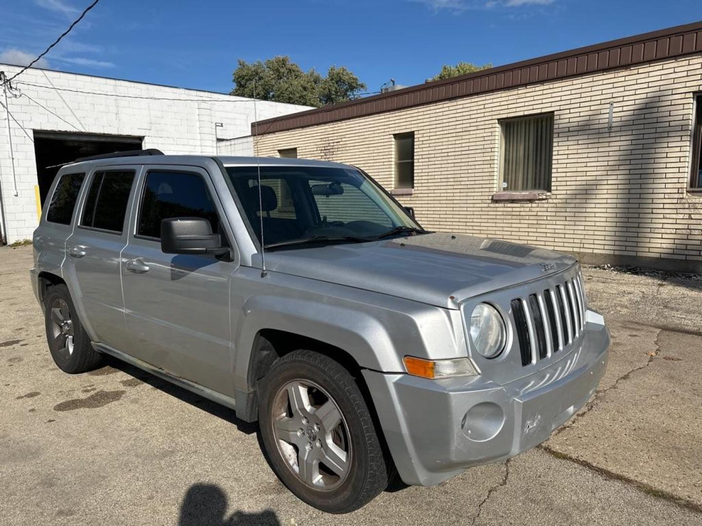 2010 SILVER JEEP PATRIOT SPORT (1J4NT2GA2AD) with an 2.0L engine, Continuously Variable transmission, located at 1708 Broadway, Rockford, IL, 61104, (815) 397-5010, 42.252522, -89.069359 - Photo#3