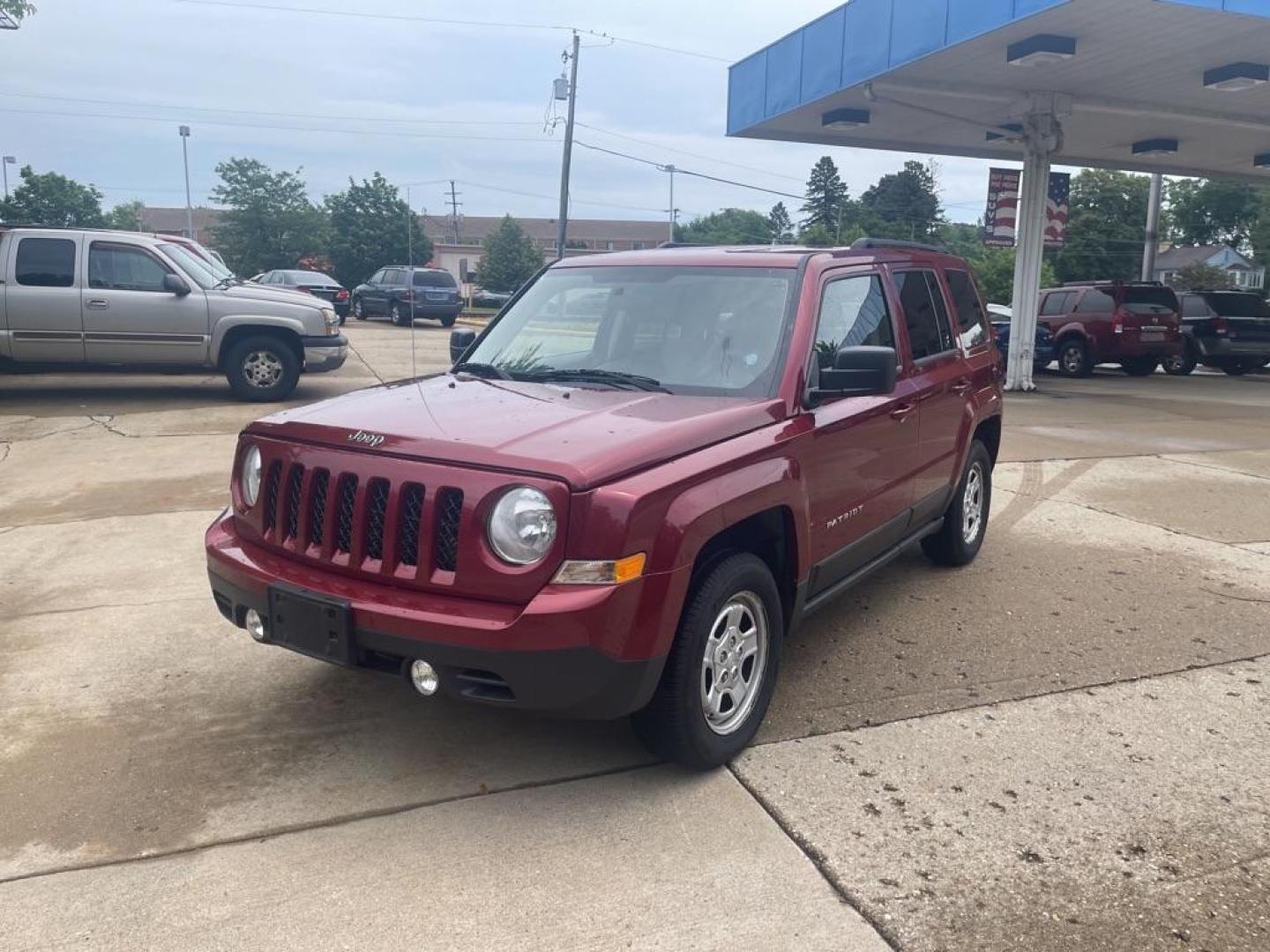 2012 RED JEEP PATRIOT SPORT (1C4NJRBB0CD) with an 2.4L engine, Continuously Variable transmission, located at 1708 Broadway, Rockford, IL, 61104, (815) 397-5010, 42.252522, -89.069359 - Photo#0