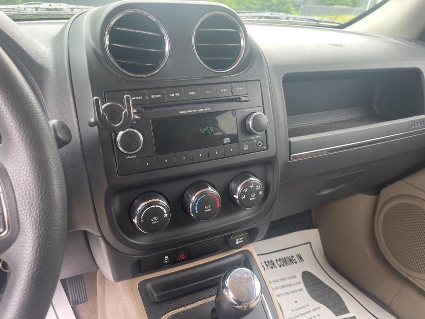 2012 RED JEEP PATRIOT SPORT (1C4NJRBB0CD) with an 2.4L engine, Continuously Variable transmission, located at 1708 Broadway, Rockford, IL, 61104, (815) 397-5010, 42.252522, -89.069359 - Photo#6