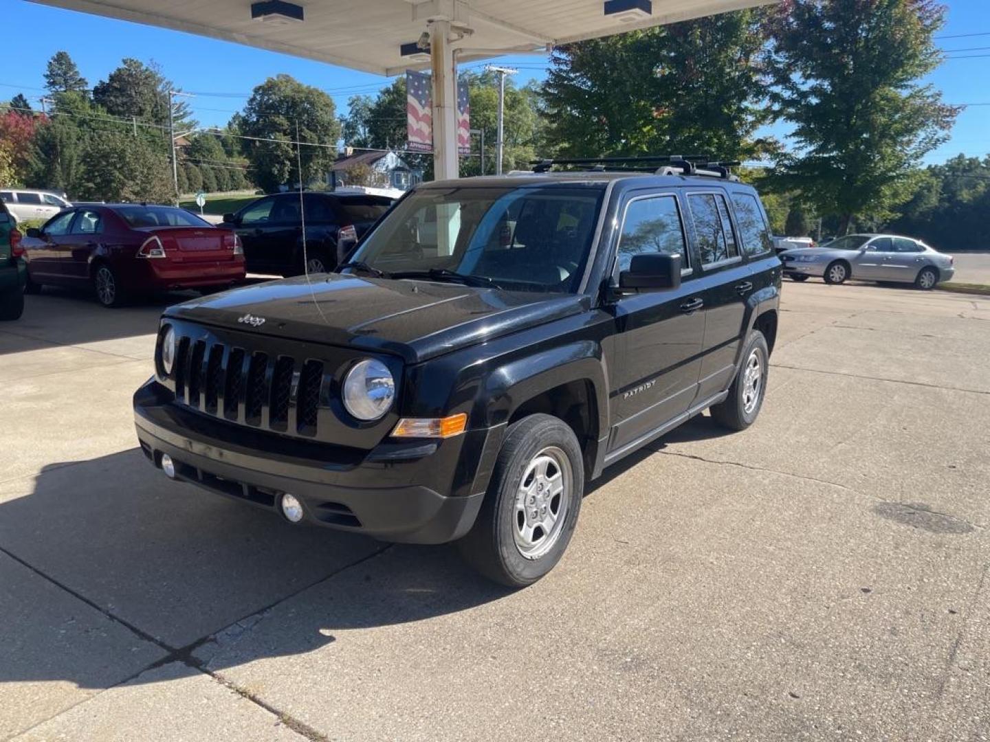 2014 BLACK JEEP PATRIOT SPORT (1C4NJRBB4ED) with an 2.4L engine, Continuously Variable transmission, located at 1708 Broadway, Rockford, IL, 61104, (815) 397-5010, 42.252522, -89.069359 - Photo#0