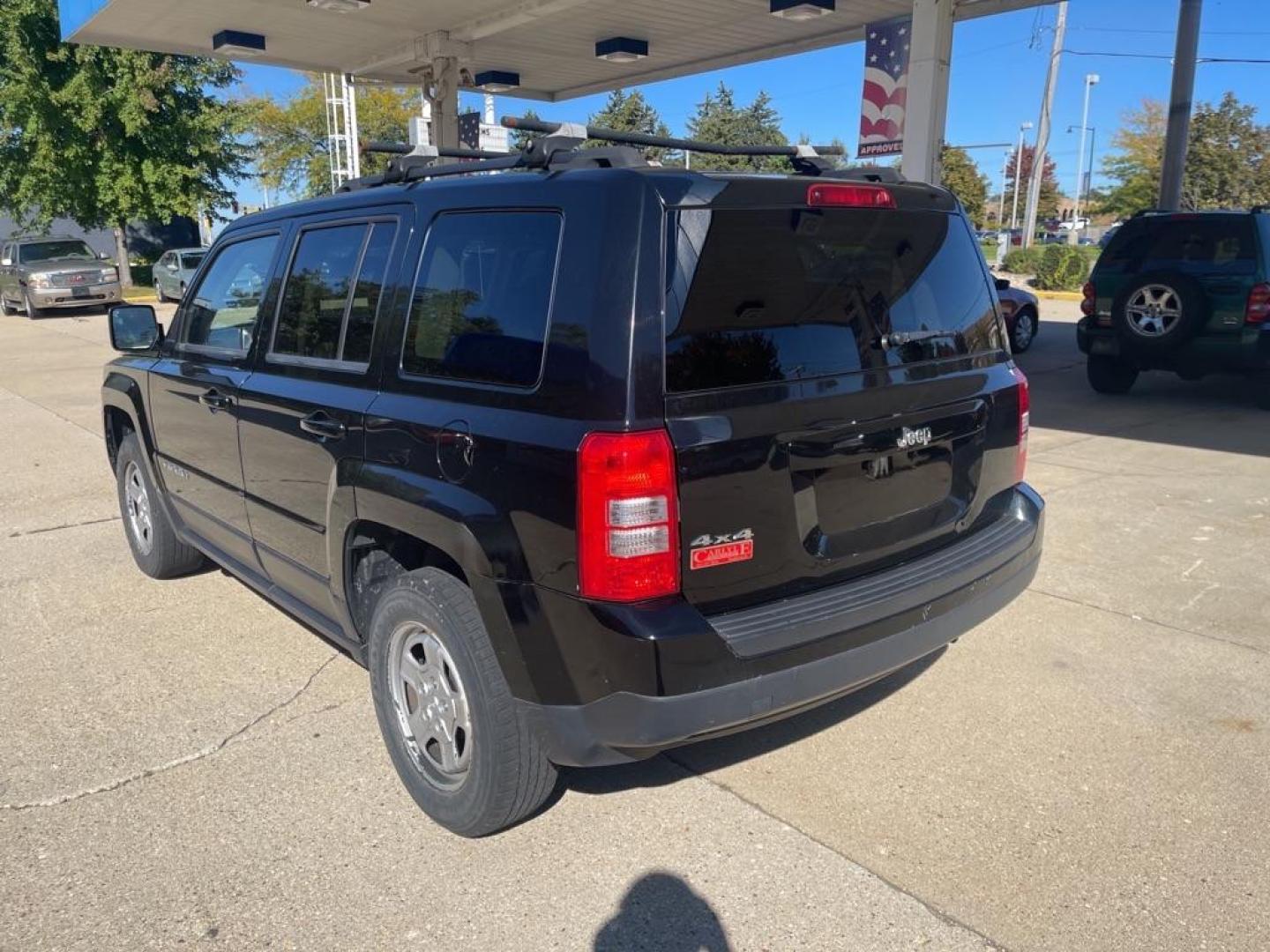 2014 BLACK JEEP PATRIOT SPORT (1C4NJRBB4ED) with an 2.4L engine, Continuously Variable transmission, located at 1708 Broadway, Rockford, IL, 61104, (815) 397-5010, 42.252522, -89.069359 - Photo#3