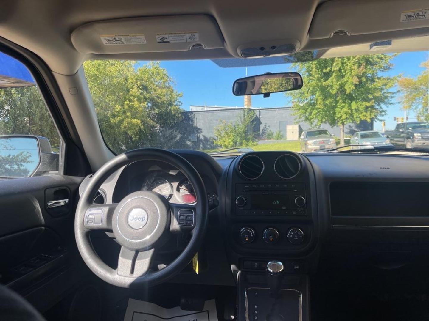 2014 BLACK JEEP PATRIOT SPORT (1C4NJRBB4ED) with an 2.4L engine, Continuously Variable transmission, located at 1708 Broadway, Rockford, IL, 61104, (815) 397-5010, 42.252522, -89.069359 - Photo#5