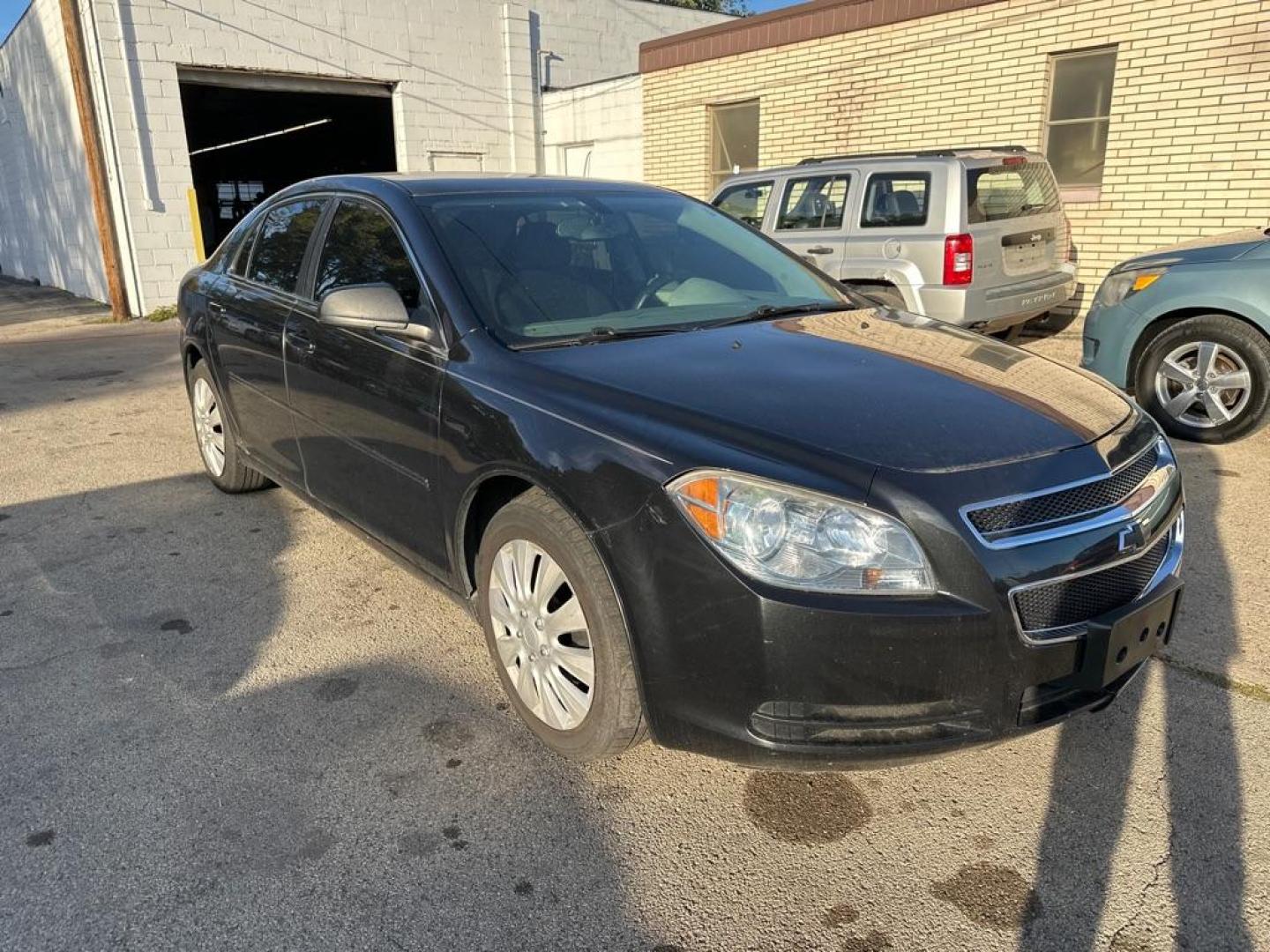 2012 BLACK CHEVROLET MALIBU LS (1G1ZB5E09CF) with an 2.4L engine, Automatic transmission, located at 1708 Broadway, Rockford, IL, 61104, (815) 397-5010, 42.252522, -89.069359 - Photo#3