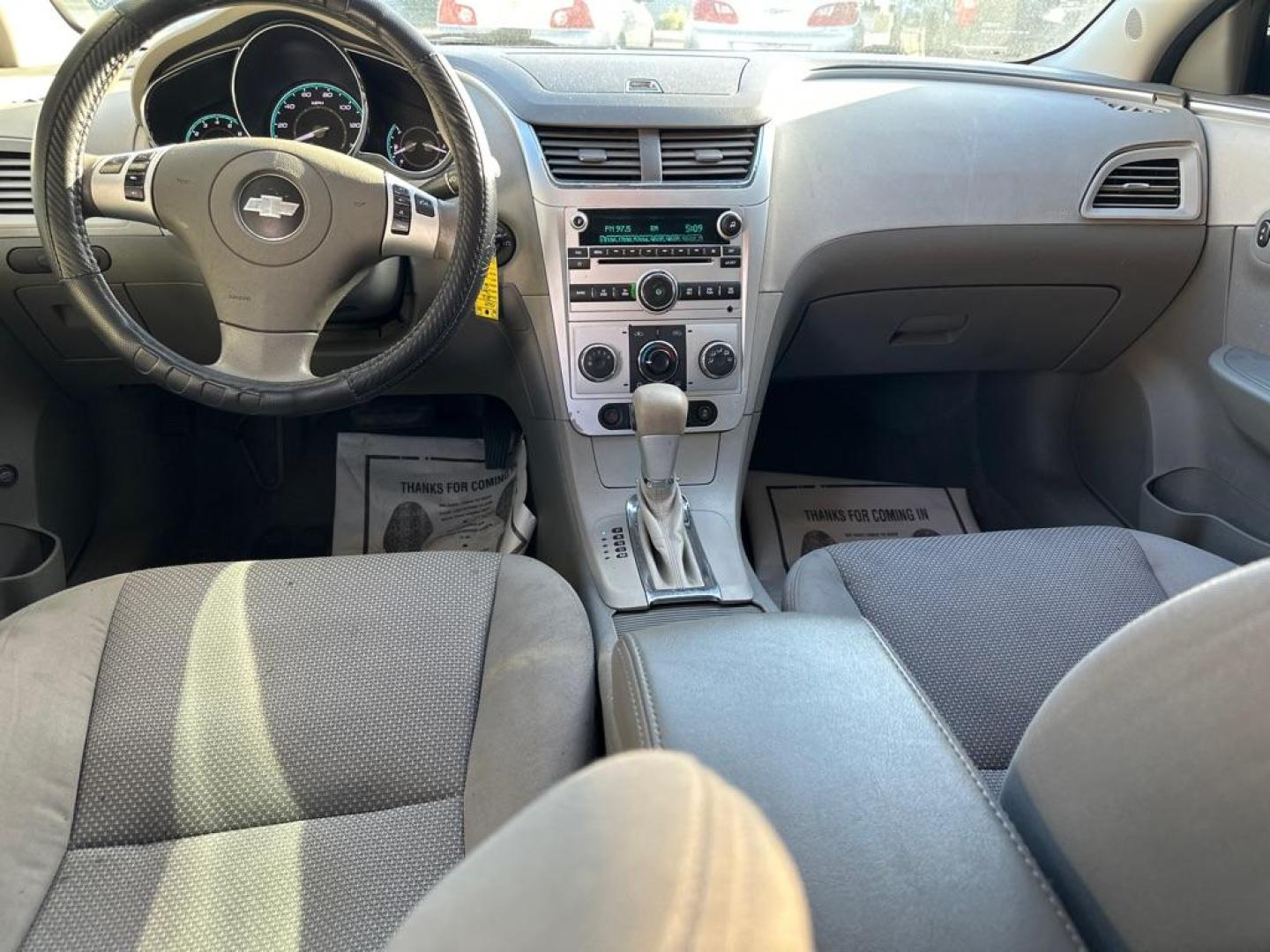 2012 BLACK CHEVROLET MALIBU LS (1G1ZB5E09CF) with an 2.4L engine, Automatic transmission, located at 1708 Broadway, Rockford, IL, 61104, (815) 397-5010, 42.252522, -89.069359 - Photo#5