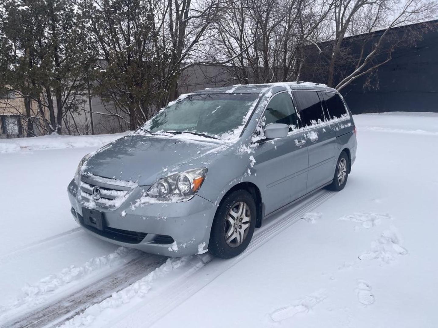 2007 BLUE HONDA ODYSSEY EX (5FNRL38407B) with an 3.5L engine, Automatic transmission, located at 1708 Broadway, Rockford, IL, 61104, (815) 397-5010, 42.252522, -89.069359 - Photo#0