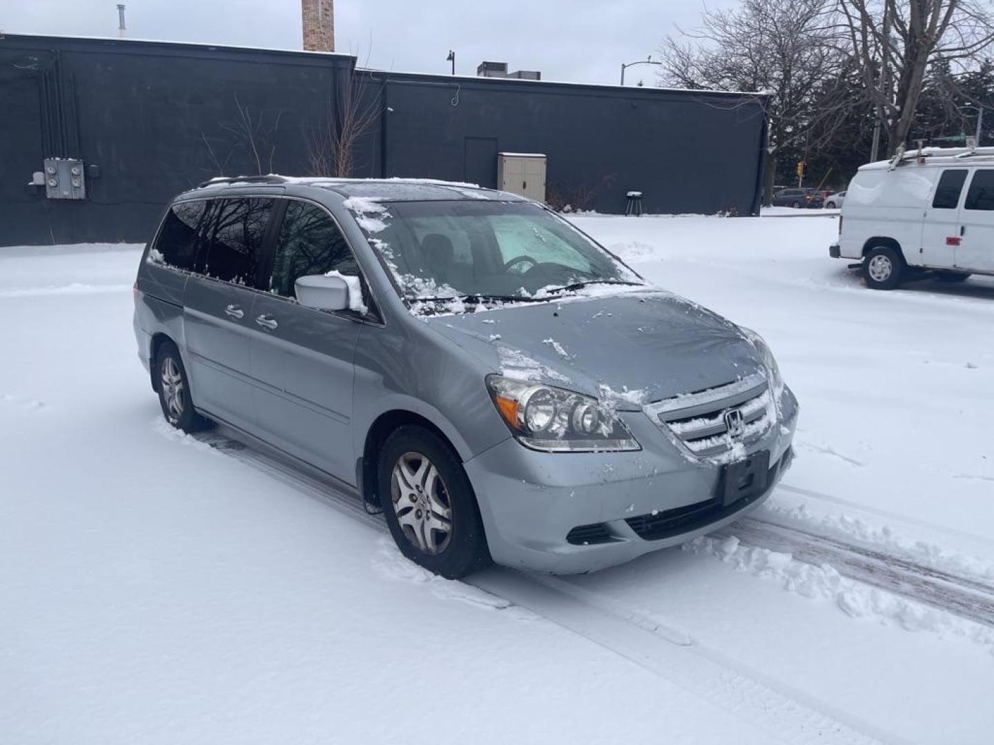 2007 BLUE HONDA ODYSSEY EX (5FNRL38407B) with an 3.5L engine, Automatic transmission, located at 1708 Broadway, Rockford, IL, 61104, (815) 397-5010, 42.252522, -89.069359 - Photo#1