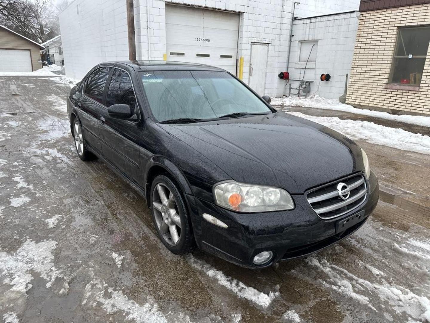 2003 BLACK NISSAN MAXIMA GLE (JN1DA31A53T) with an 3.5L engine, Automatic transmission, located at 1708 Broadway, Rockford, IL, 61104, (815) 397-5010, 42.252522, -89.069359 - Photo#3