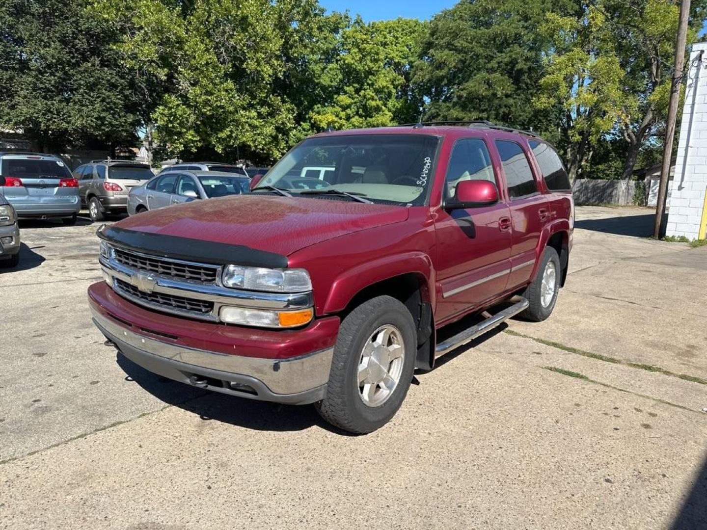 2005 RED CHEVROLET TAHOE 1500 (1GNEK13T25J) with an 5.3L engine, Automatic transmission, located at 1708 Broadway, Rockford, IL, 61104, (815) 397-5010, 42.252522, -89.069359 - Photo#0