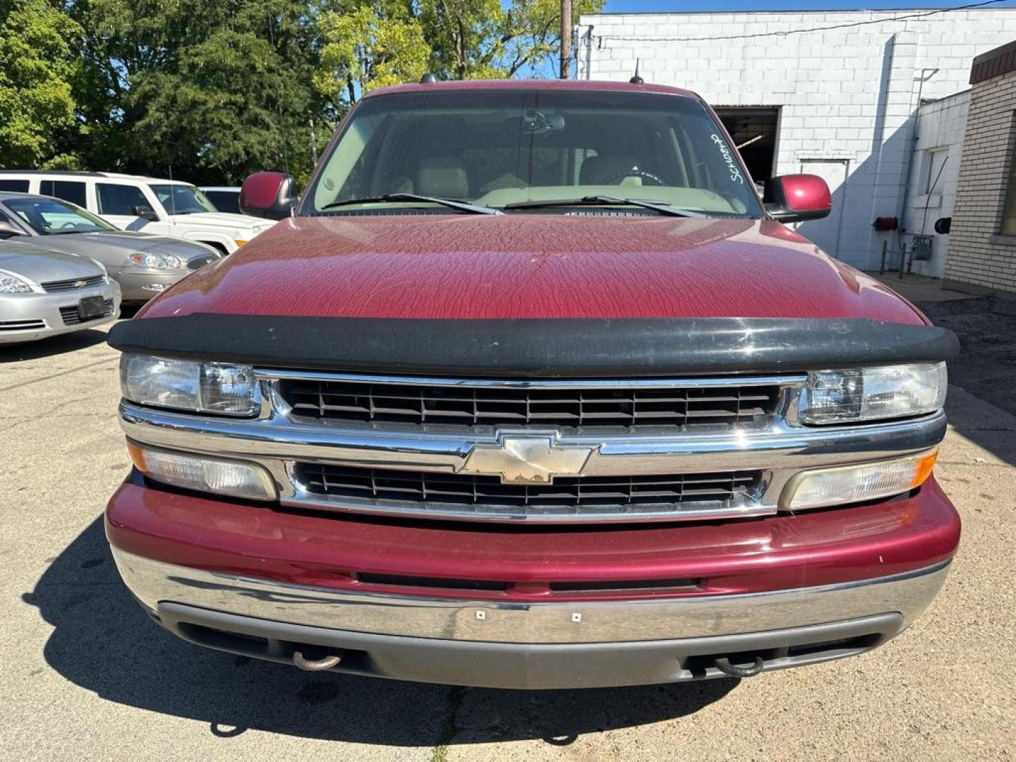 2005 RED CHEVROLET TAHOE 1500 (1GNEK13T25J) with an 5.3L engine, Automatic transmission, located at 1708 Broadway, Rockford, IL, 61104, (815) 397-5010, 42.252522, -89.069359 - Photo#4