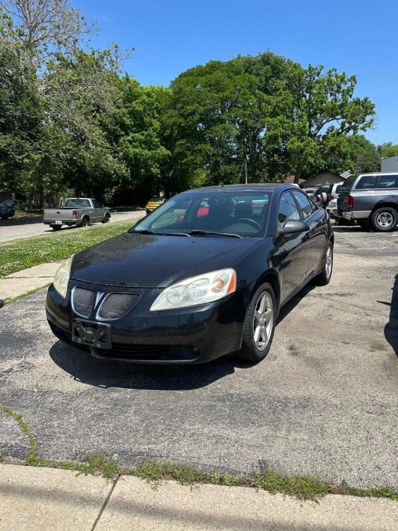 2009 BLACK PONTIAC G6 GT (1G2ZH57N794) with an 3.5L engine, Automatic transmission, located at 1708 Broadway, Rockford, IL, 61104, (815) 397-5010, 42.252522, -89.069359 - Photo#1