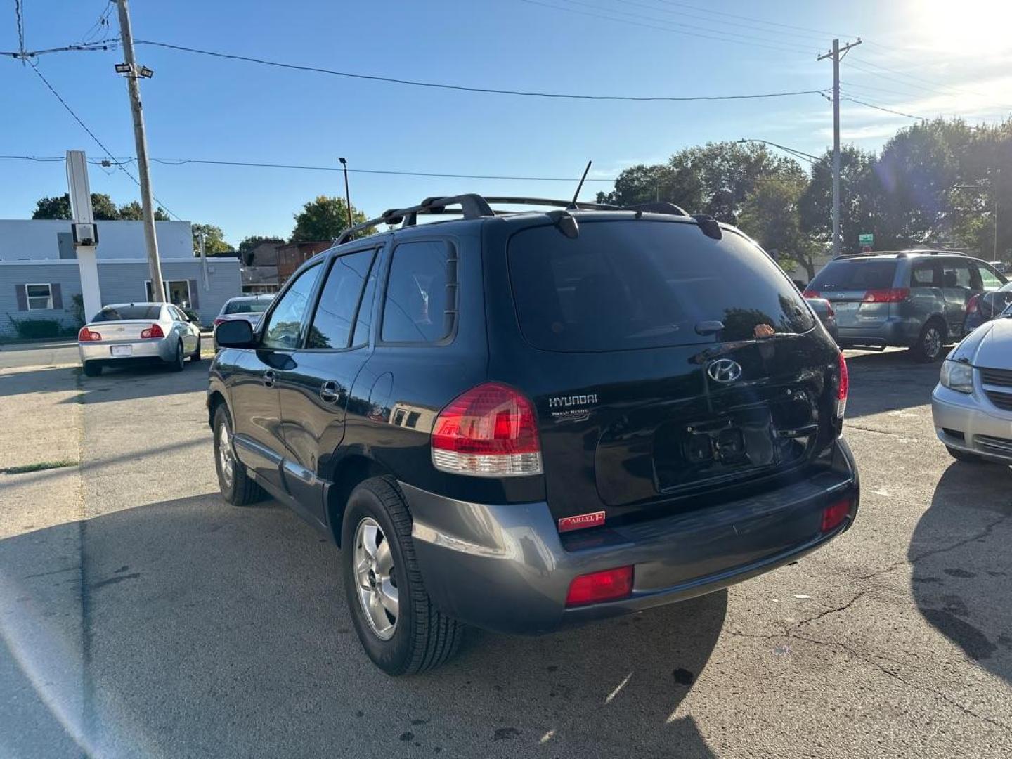 2006 BLACK HYUNDAI SANTA FE GLS (KM8SC73D36U) with an 2.7L engine, Automatic transmission, located at 1708 Broadway, Rockford, IL, 61104, (815) 397-5010, 42.252522, -89.069359 - Photo#1