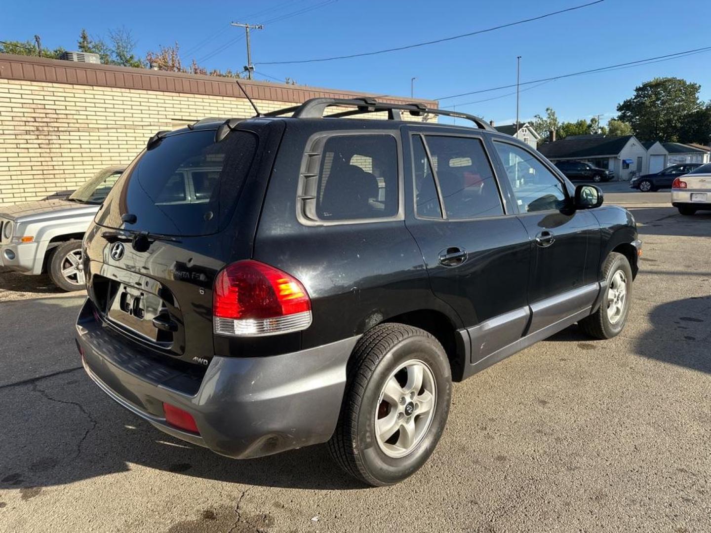 2006 BLACK HYUNDAI SANTA FE GLS (KM8SC73D36U) with an 2.7L engine, Automatic transmission, located at 1708 Broadway, Rockford, IL, 61104, (815) 397-5010, 42.252522, -89.069359 - Photo#2