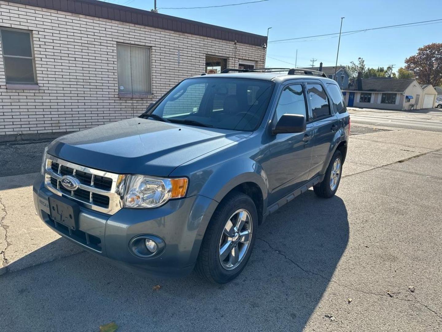 2012 BLUE FORD ESCAPE XLT (1FMCU0DG3CK) with an 3.0L engine, Automatic transmission, located at 1708 Broadway, Rockford, IL, 61104, (815) 397-5010, 42.252522, -89.069359 - Photo#0