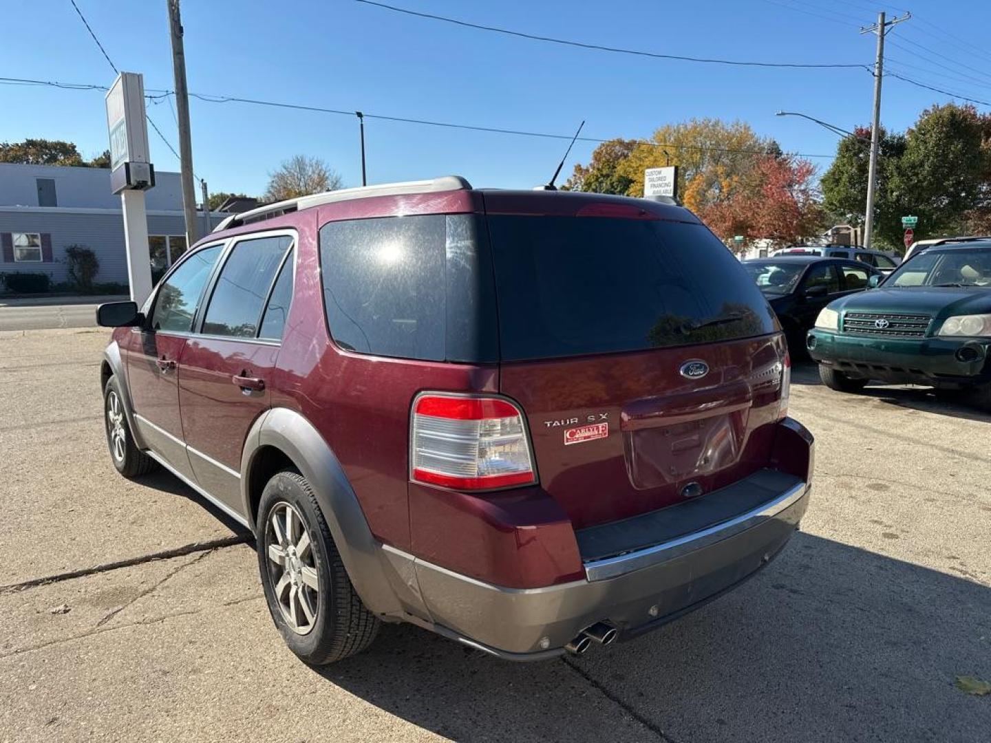 2008 MAROON FORD TAURUS X SEL (1FMDK02W38G) with an 3.5L engine, Automatic transmission, located at 1708 Broadway, Rockford, IL, 61104, (815) 397-5010, 42.252522, -89.069359 - Photo#1