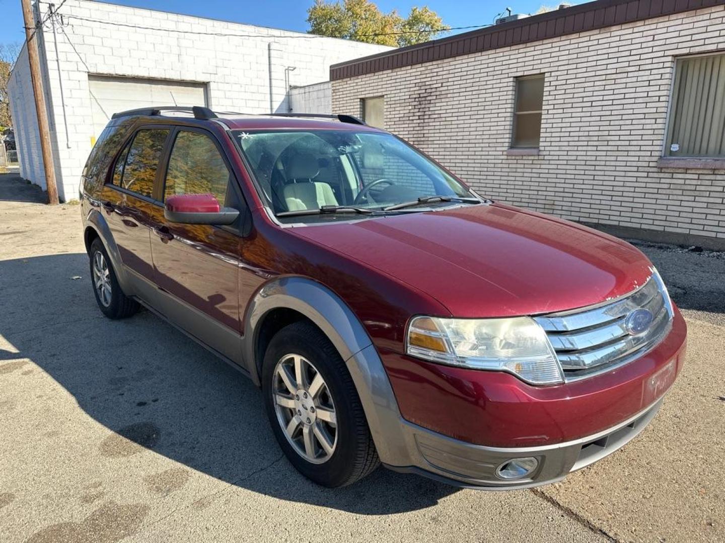 2008 MAROON FORD TAURUS X SEL (1FMDK02W38G) with an 3.5L engine, Automatic transmission, located at 1708 Broadway, Rockford, IL, 61104, (815) 397-5010, 42.252522, -89.069359 - Photo#3