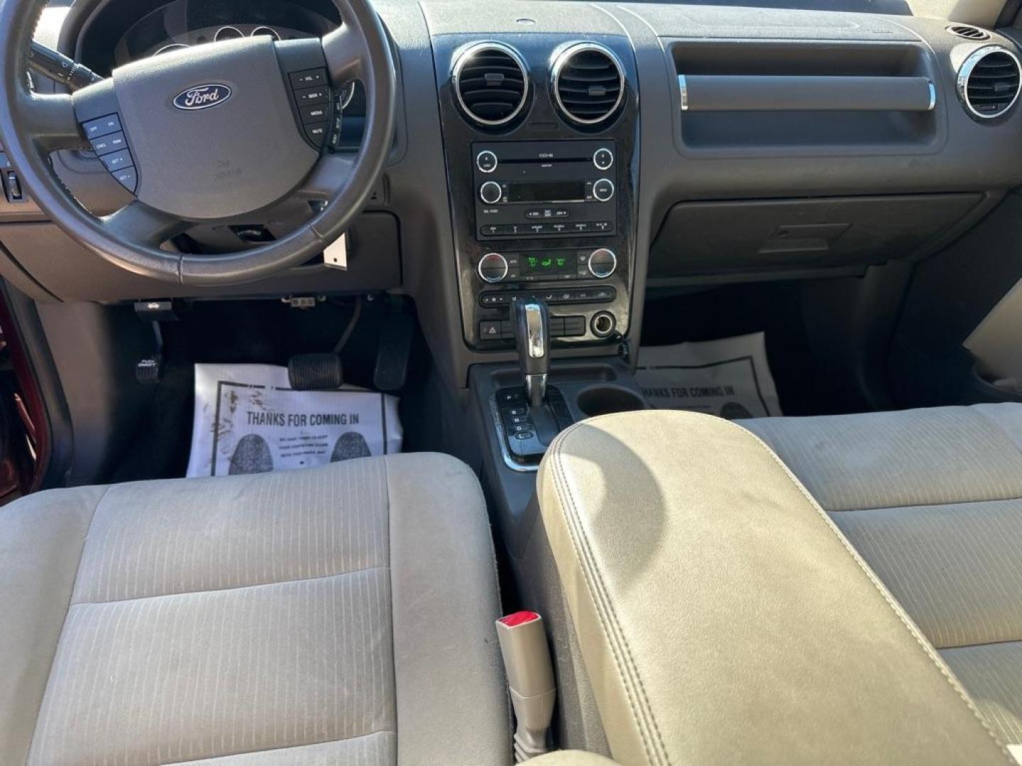 2008 MAROON FORD TAURUS X SEL (1FMDK02W38G) with an 3.5L engine, Automatic transmission, located at 1708 Broadway, Rockford, IL, 61104, (815) 397-5010, 42.252522, -89.069359 - Photo#6