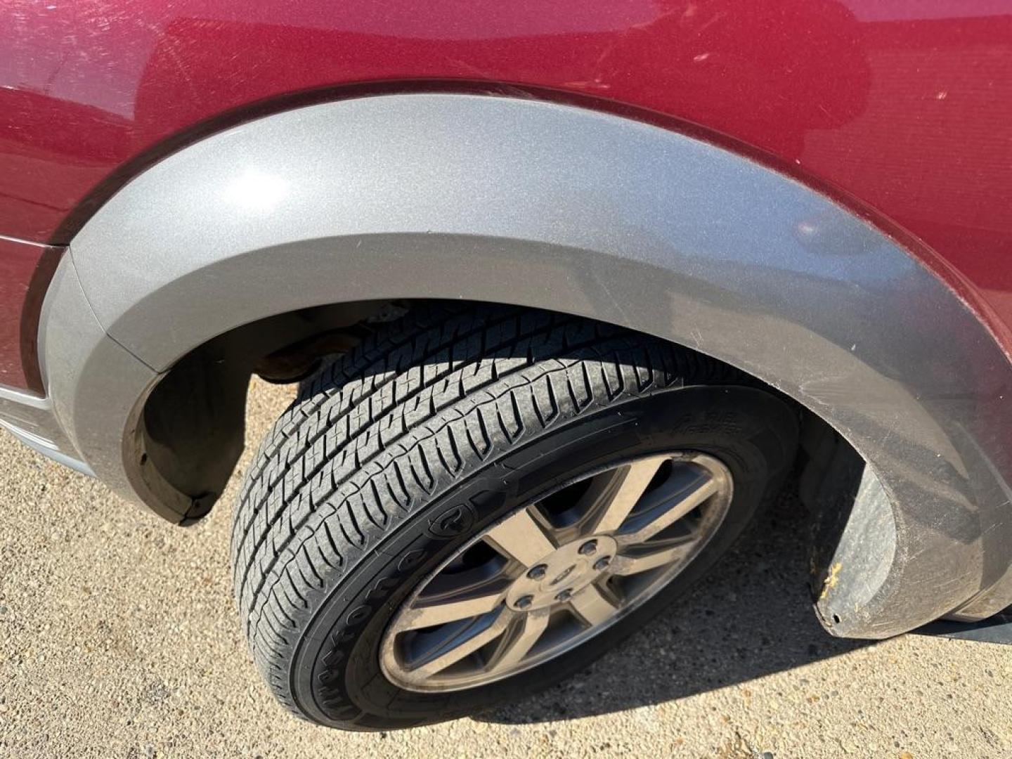 2008 MAROON FORD TAURUS X SEL (1FMDK02W38G) with an 3.5L engine, Automatic transmission, located at 1708 Broadway, Rockford, IL, 61104, (815) 397-5010, 42.252522, -89.069359 - Photo#8