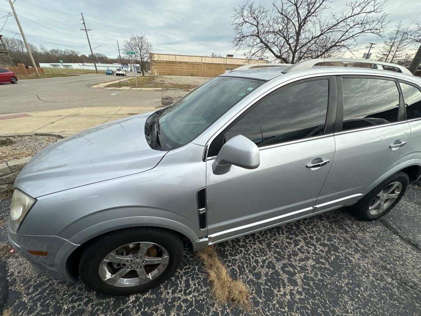 2013 SILVER CHEVROLET CAPTIVA LT (3GNAL3EK8DS) with an 2.4L engine, Automatic transmission, located at 1708 Broadway, Rockford, IL, 61104, (815) 397-5010, 42.252522, -89.069359 - Photo#0