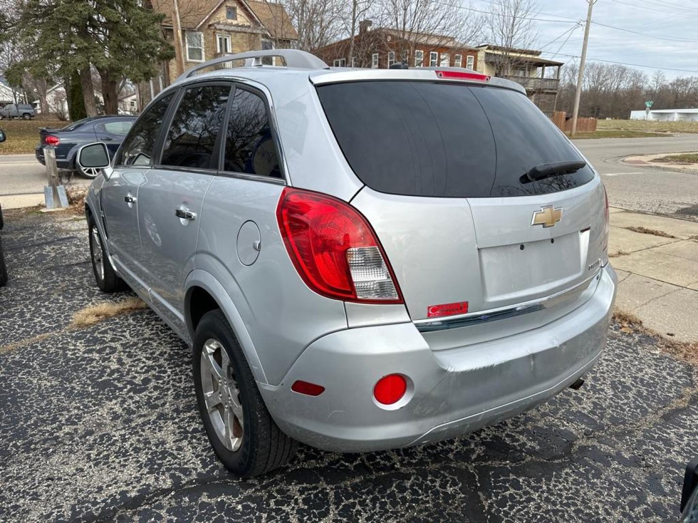 2013 SILVER CHEVROLET CAPTIVA LT (3GNAL3EK8DS) with an 2.4L engine, Automatic transmission, located at 1708 Broadway, Rockford, IL, 61104, (815) 397-5010, 42.252522, -89.069359 - Photo#1