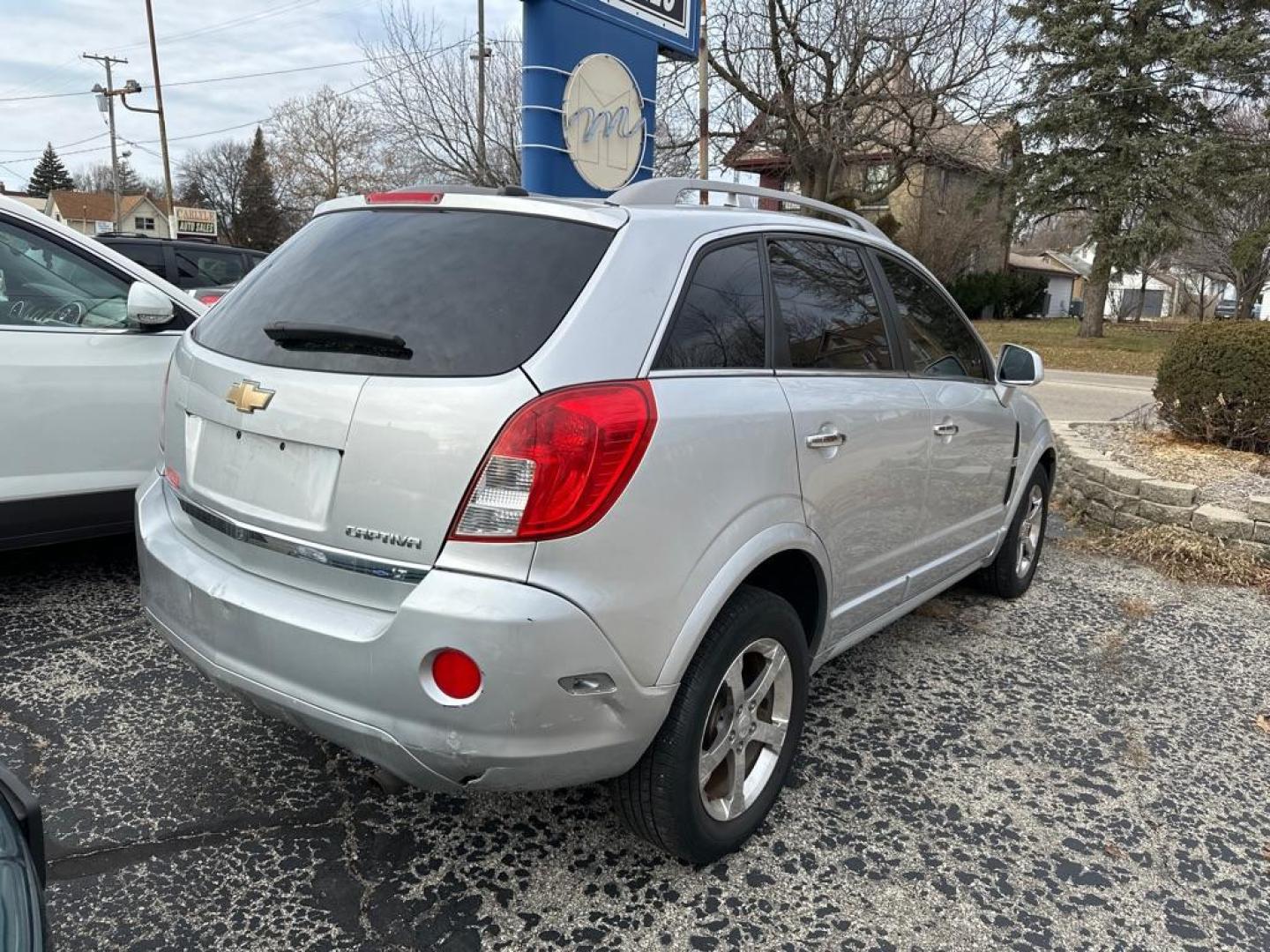 2013 SILVER CHEVROLET CAPTIVA LT (3GNAL3EK8DS) with an 2.4L engine, Automatic transmission, located at 1708 Broadway, Rockford, IL, 61104, (815) 397-5010, 42.252522, -89.069359 - Photo#2