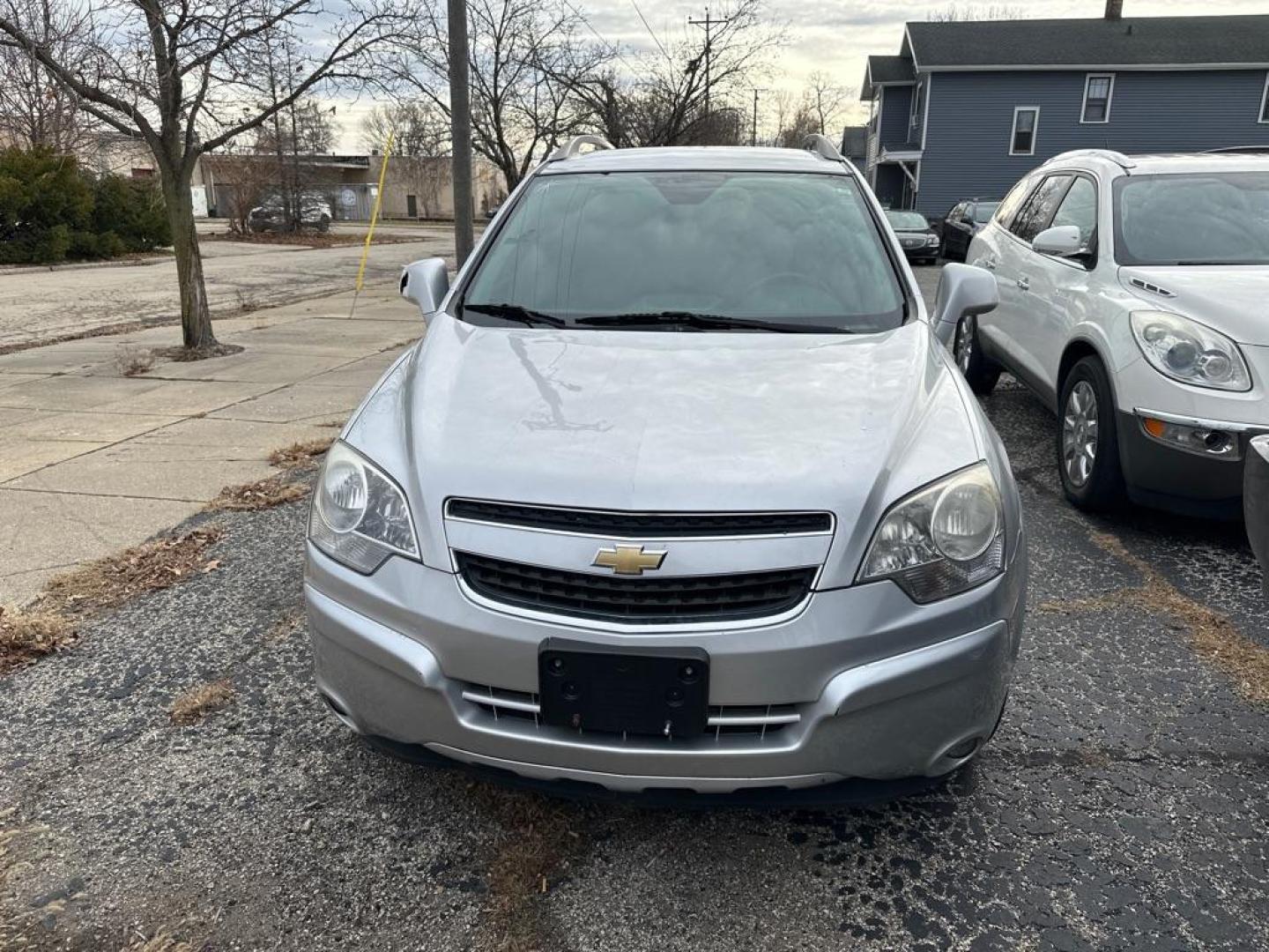 2013 SILVER CHEVROLET CAPTIVA LT (3GNAL3EK8DS) with an 2.4L engine, Automatic transmission, located at 1708 Broadway, Rockford, IL, 61104, (815) 397-5010, 42.252522, -89.069359 - Photo#4