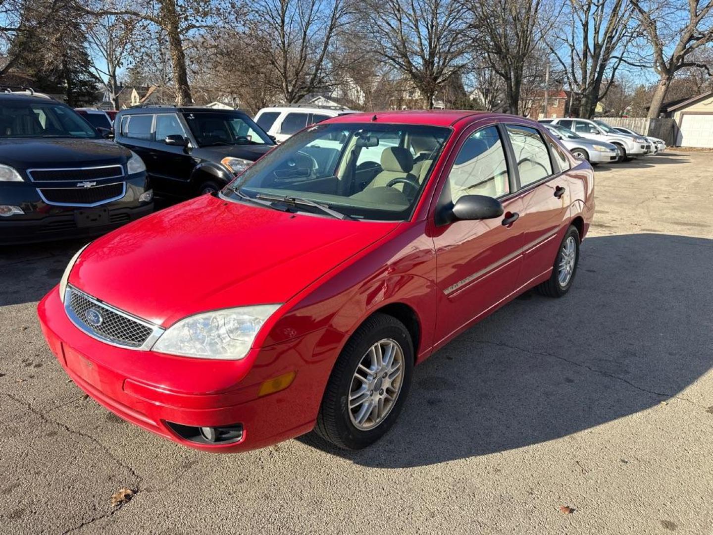 2007 RED FORD FOCUS ZX4 (1FAHP34N67W) with an 2.0L engine, Automatic transmission, located at 1708 Broadway, Rockford, IL, 61104, (815) 397-5010, 42.252522, -89.069359 - Photo#0