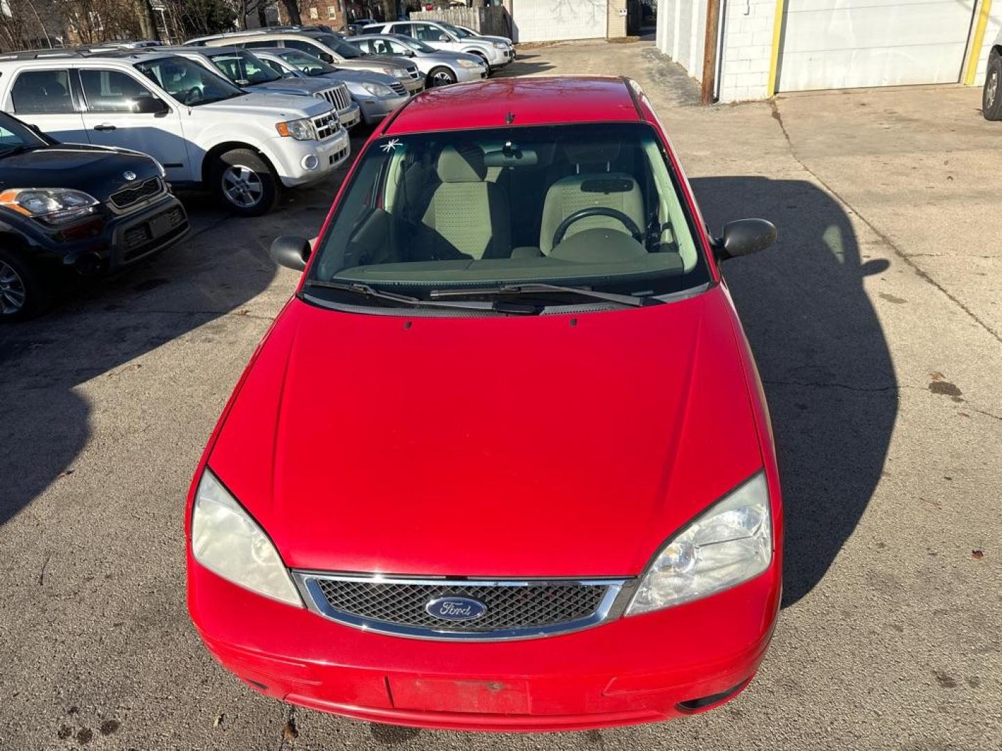 2007 RED FORD FOCUS ZX4 (1FAHP34N67W) with an 2.0L engine, Automatic transmission, located at 1708 Broadway, Rockford, IL, 61104, (815) 397-5010, 42.252522, -89.069359 - Photo#4