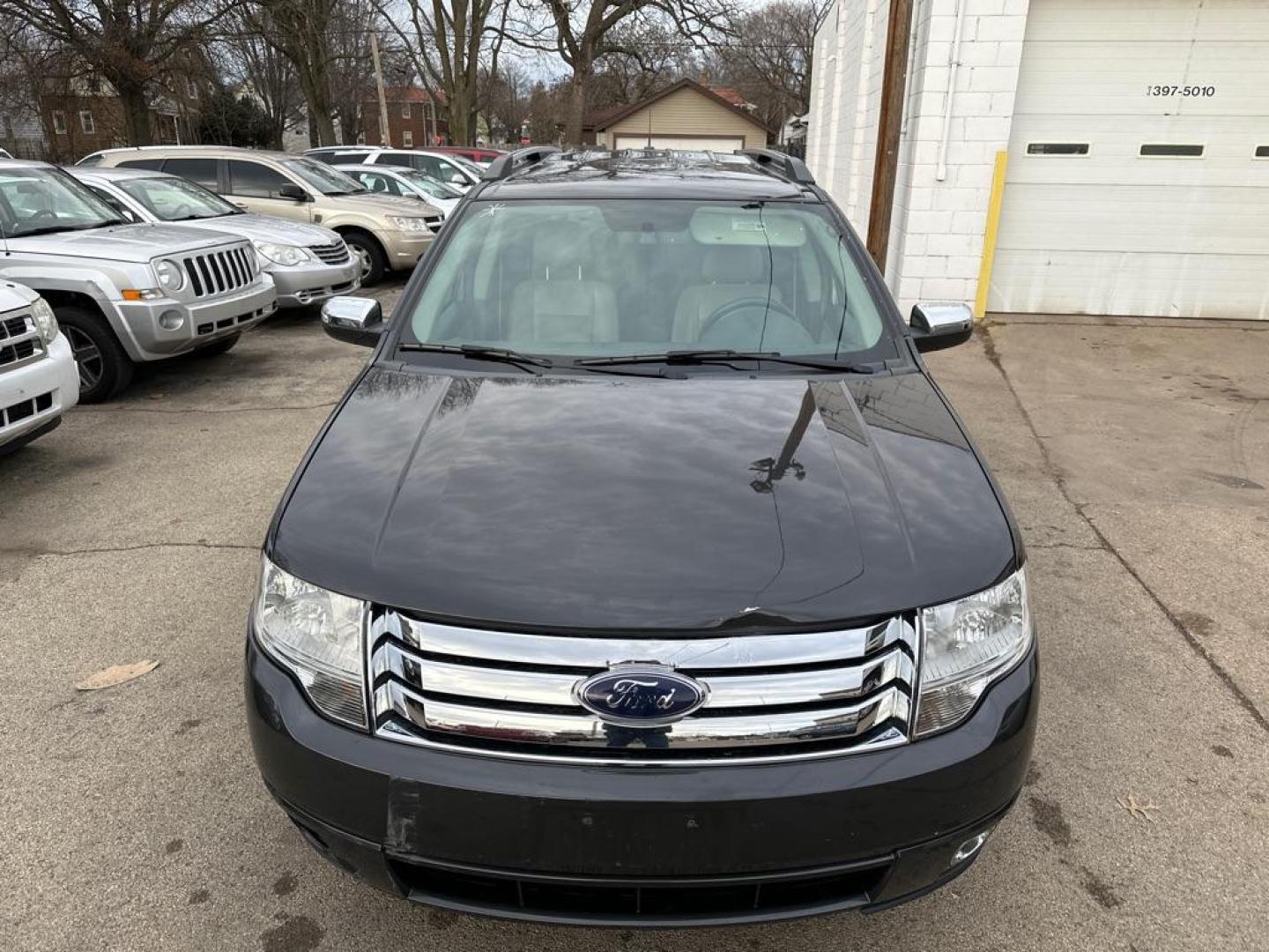 2008 GREY FORD TAURUS X LIMITED (1FMDK06W88G) with an 3.5L engine, Automatic transmission, located at 1708 Broadway, Rockford, IL, 61104, (815) 397-5010, 42.252522, -89.069359 - Photo#4