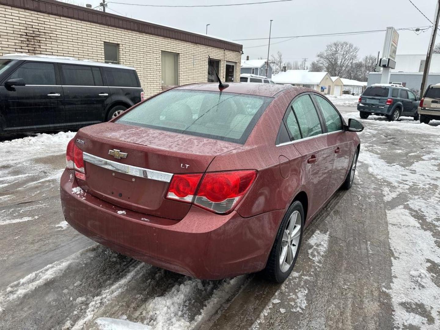 2013 BROWN CHEVROLET CRUZE LT (1G1PE5SB0D7) with an 1.4L engine, Automatic transmission, located at 1708 Broadway, Rockford, IL, 61104, (815) 397-5010, 42.252522, -89.069359 - Photo#2