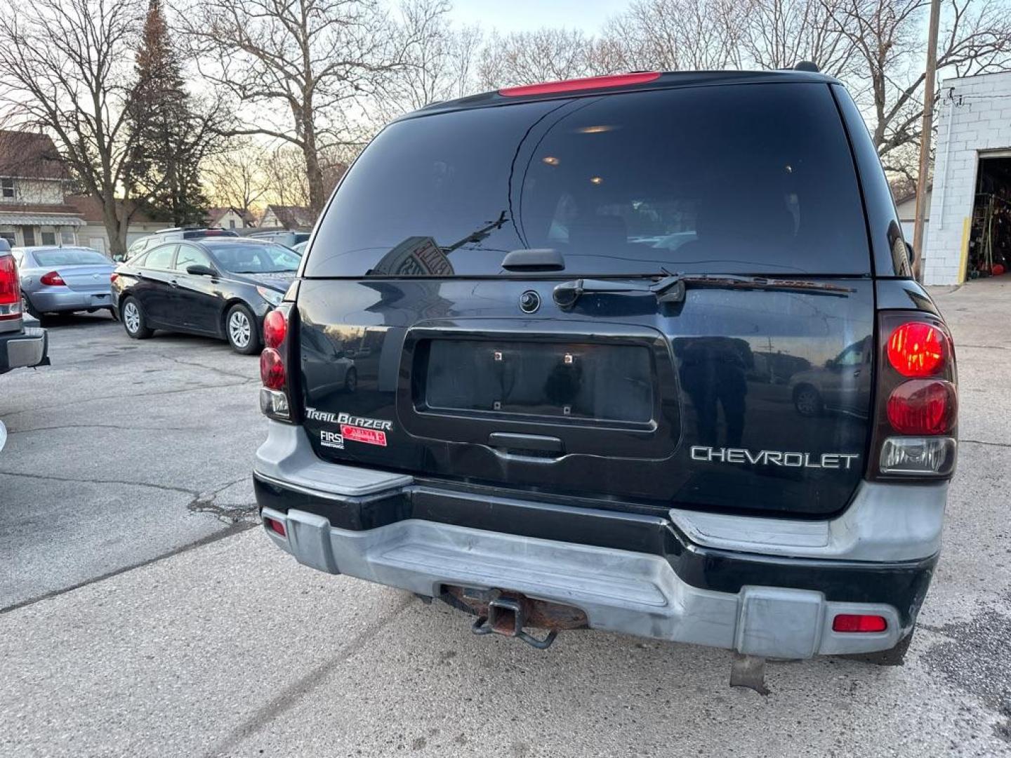 2003 BLACK CHEVROLET TRAILBLAZER (1GNDT13S032) with an 4.2L engine, Automatic transmission, located at 1708 Broadway, Rockford, IL, 61104, (815) 397-5010, 42.252522, -89.069359 - Photo#2