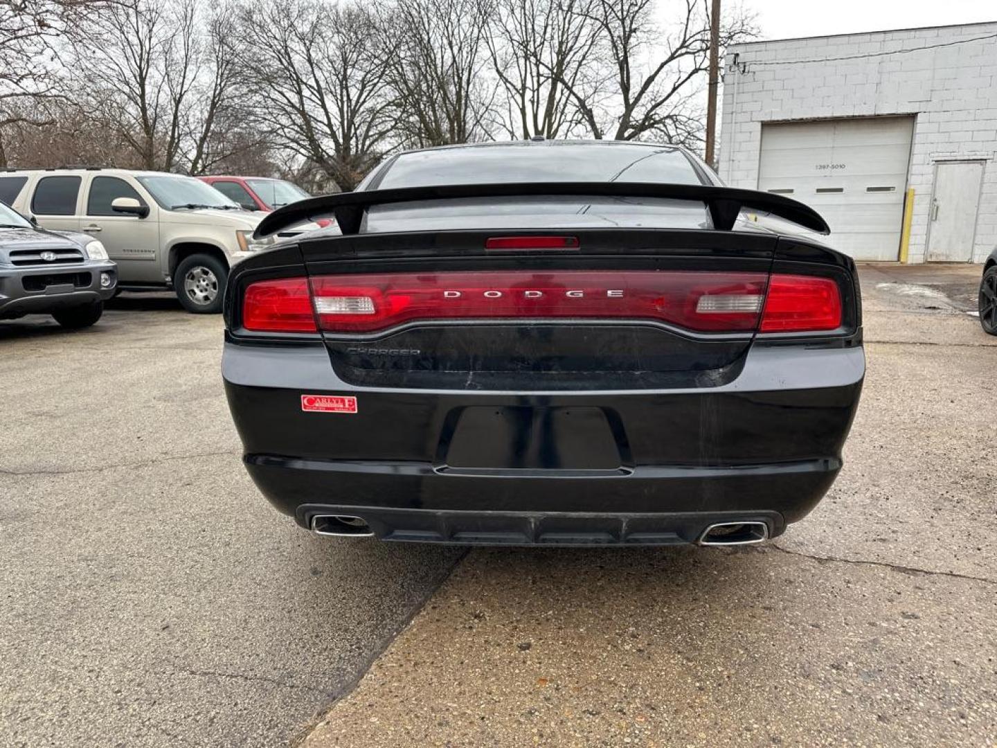 2012 BLACK DODGE CHARGER SE (2C3CDXBG5CH) with an 3.6L engine, Automatic transmission, located at 1708 Broadway, Rockford, IL, 61104, (815) 397-5010, 42.252522, -89.069359 - Photo#2