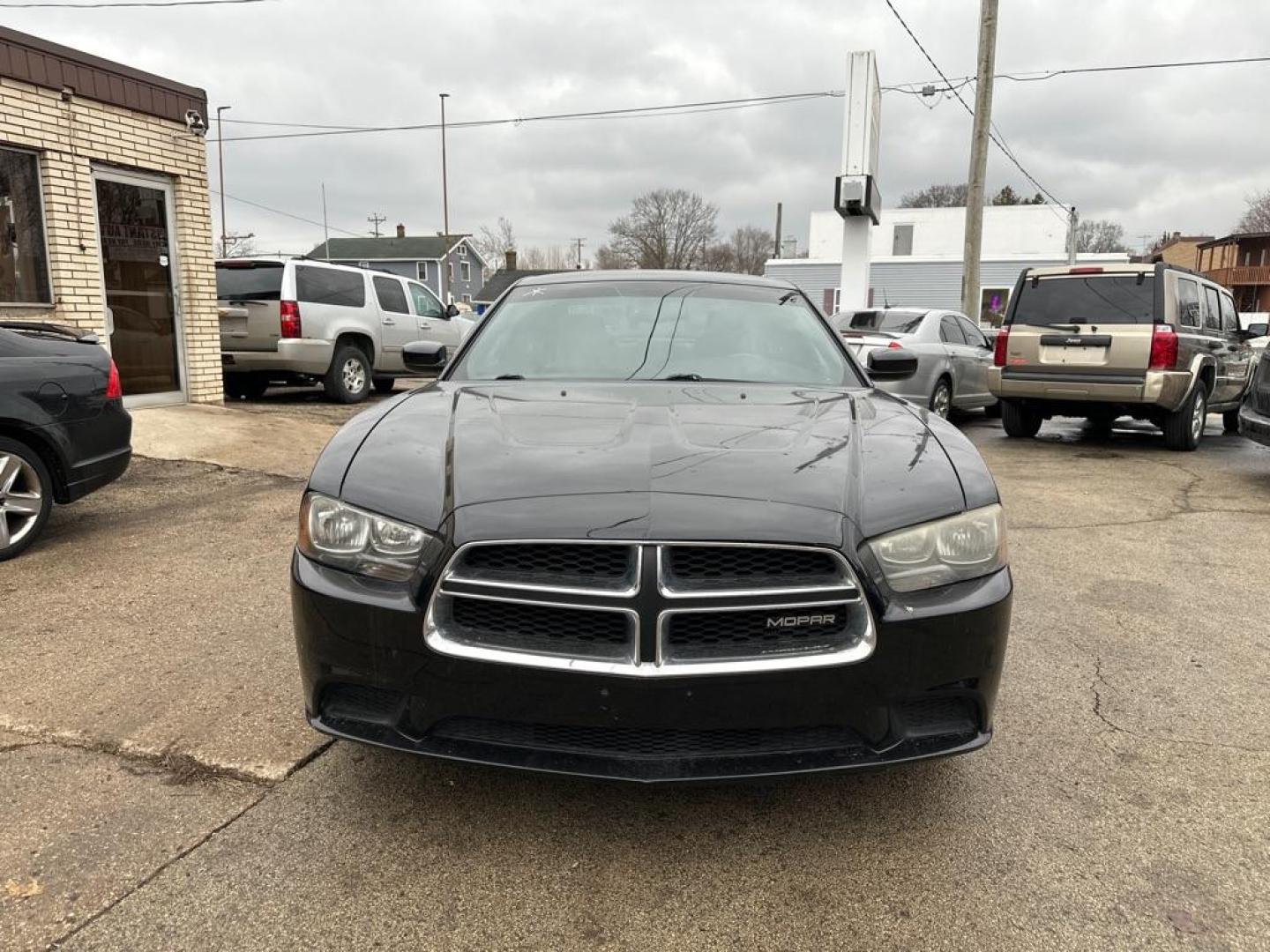 2012 BLACK DODGE CHARGER SE (2C3CDXBG5CH) with an 3.6L engine, Automatic transmission, located at 1708 Broadway, Rockford, IL, 61104, (815) 397-5010, 42.252522, -89.069359 - Photo#4