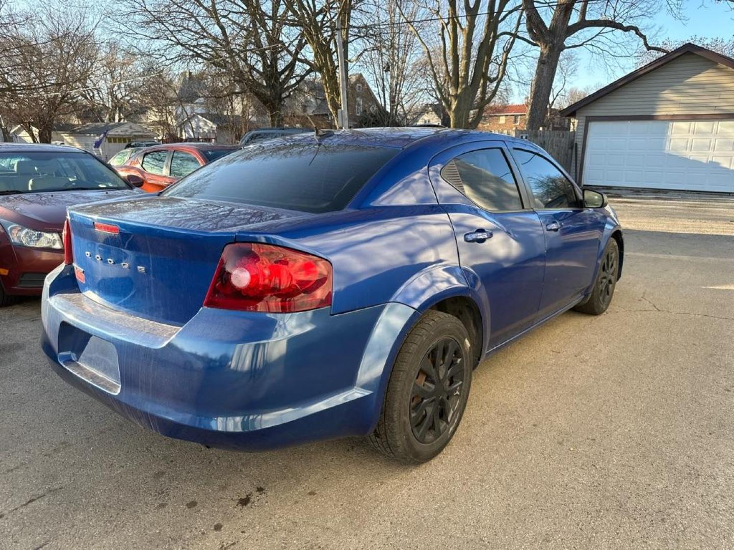 2012 BLUE DODGE AVENGER SE (1C3CDZAB1CN) with an 2.4L engine, Automatic transmission, located at 1708 Broadway, Rockford, IL, 61104, (815) 397-5010, 42.252522, -89.069359 - Photo#3