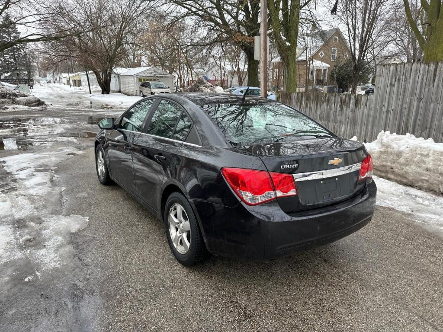 2012 BLACK CHEVROLET CRUZE LT (1G1PF5SC1C7) with an 1.4L engine, Automatic transmission, located at 1708 Broadway, Rockford, IL, 61104, (815) 397-5010, 42.252522, -89.069359 - Photo#1