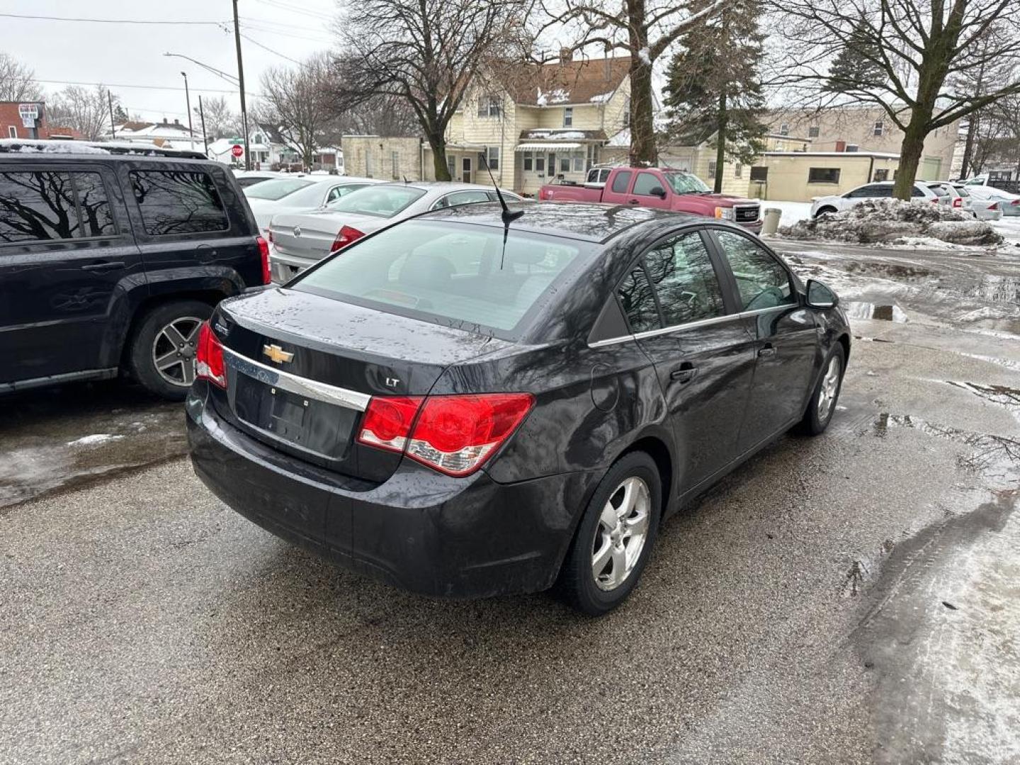 2012 BLACK CHEVROLET CRUZE LT (1G1PF5SC1C7) with an 1.4L engine, Automatic transmission, located at 1708 Broadway, Rockford, IL, 61104, (815) 397-5010, 42.252522, -89.069359 - Photo#3