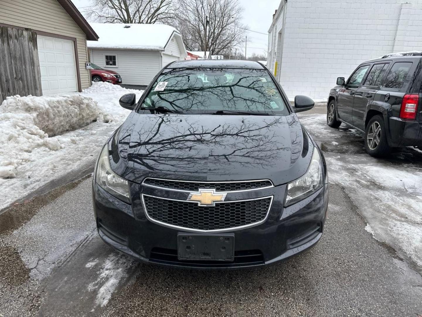 2012 BLACK CHEVROLET CRUZE LT (1G1PF5SC1C7) with an 1.4L engine, Automatic transmission, located at 1708 Broadway, Rockford, IL, 61104, (815) 397-5010, 42.252522, -89.069359 - Photo#5