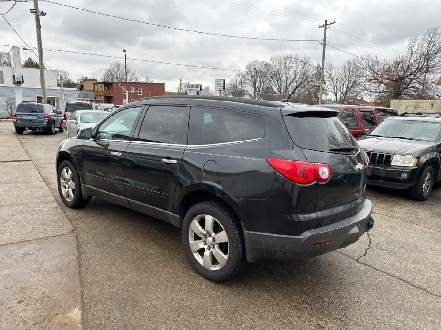 2011 BLACK CHEVROLET TRAVERSE LT (1GNKRGED1BJ) with an 3.6L engine, Automatic transmission, located at 1708 Broadway, Rockford, IL, 61104, (815) 397-5010, 42.252522, -89.069359 - Photo#1