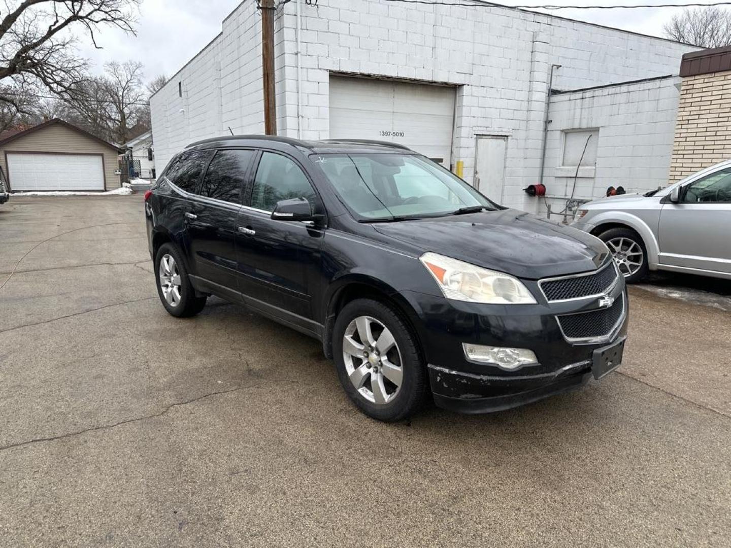 2011 BLACK CHEVROLET TRAVERSE LT (1GNKRGED1BJ) with an 3.6L engine, Automatic transmission, located at 1708 Broadway, Rockford, IL, 61104, (815) 397-5010, 42.252522, -89.069359 - Photo#3