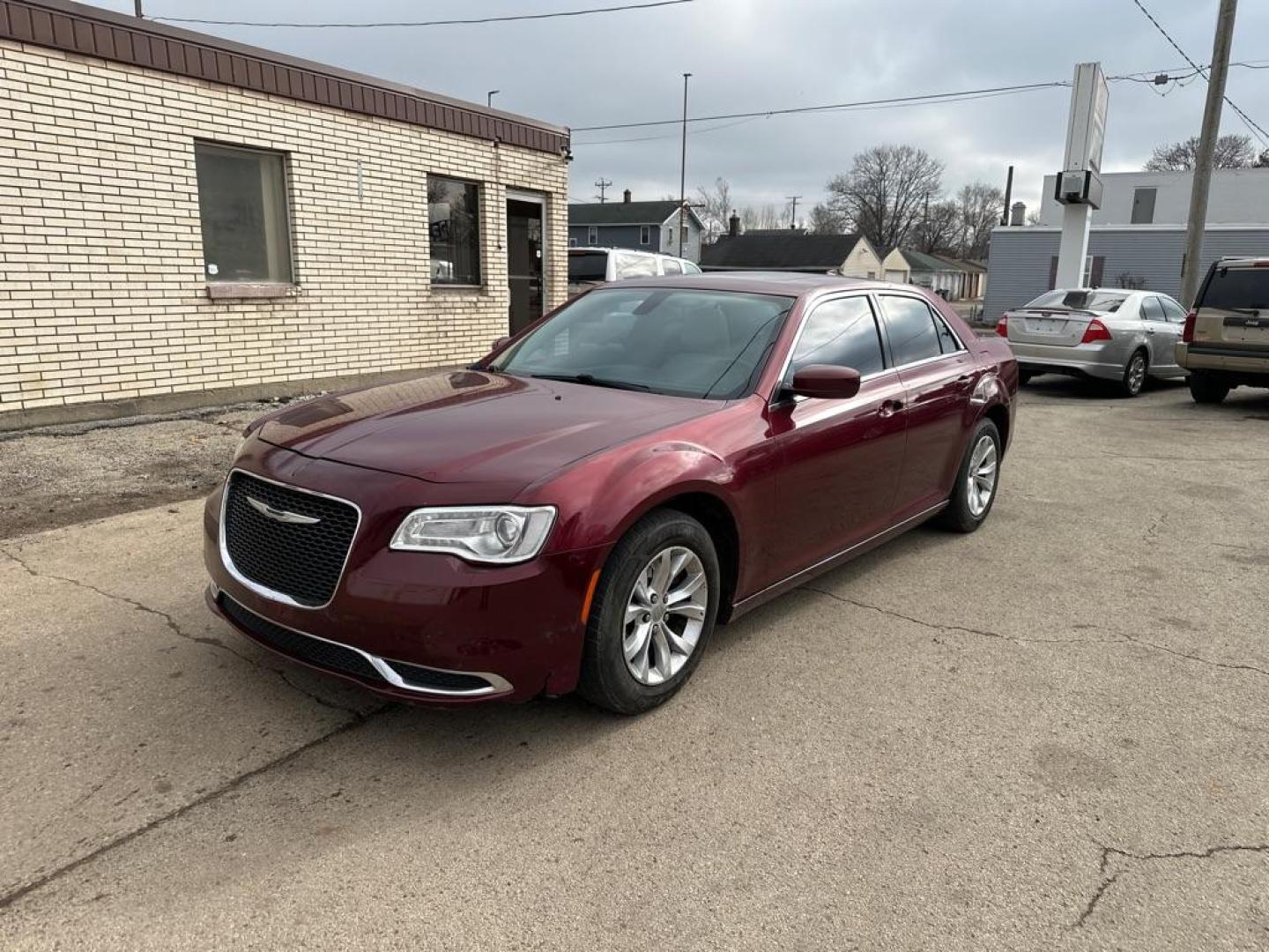 2016 RED CHRYSLER 300 LIMITED (2C3CCAAG2GH) with an 3.6L engine, Automatic transmission, located at 1708 Broadway, Rockford, IL, 61104, (815) 397-5010, 42.252522, -89.069359 - Photo#0