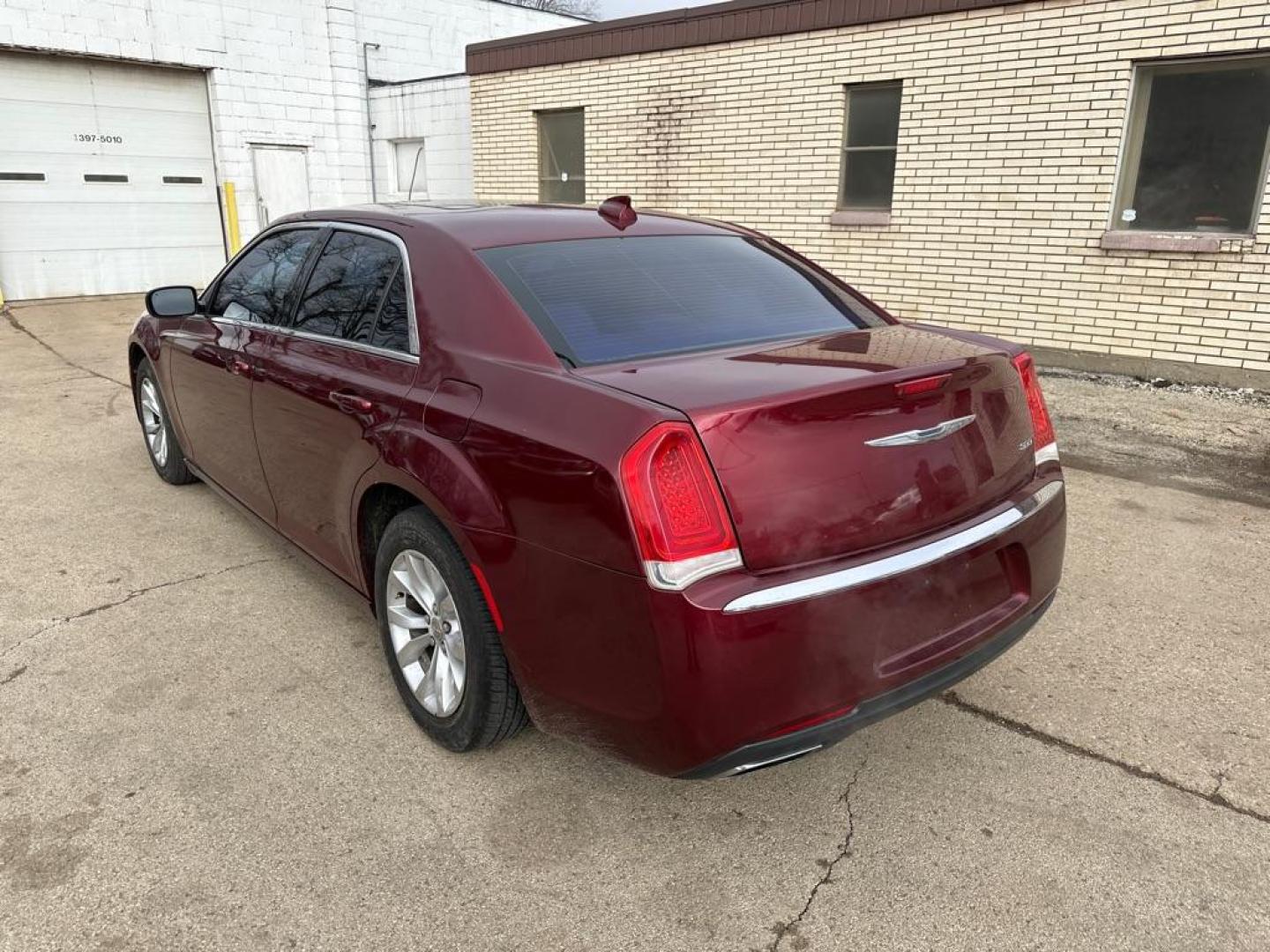 2016 RED CHRYSLER 300 LIMITED (2C3CCAAG2GH) with an 3.6L engine, Automatic transmission, located at 1708 Broadway, Rockford, IL, 61104, (815) 397-5010, 42.252522, -89.069359 - Photo#1