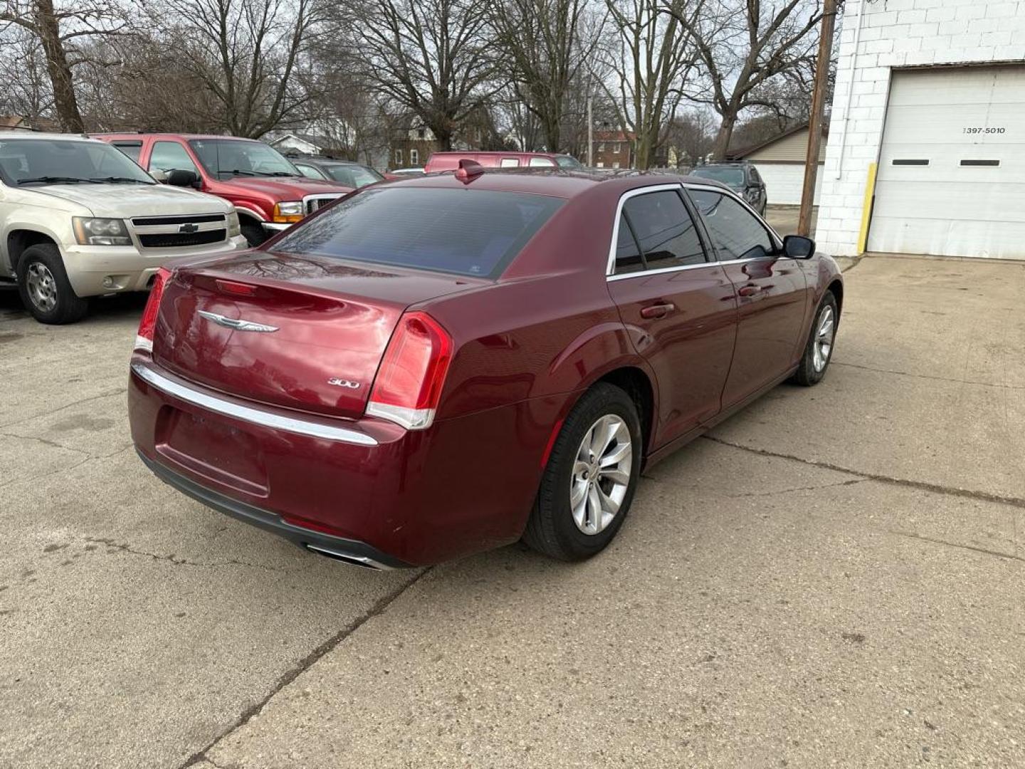 2016 RED CHRYSLER 300 LIMITED (2C3CCAAG2GH) with an 3.6L engine, Automatic transmission, located at 1708 Broadway, Rockford, IL, 61104, (815) 397-5010, 42.252522, -89.069359 - Photo#2