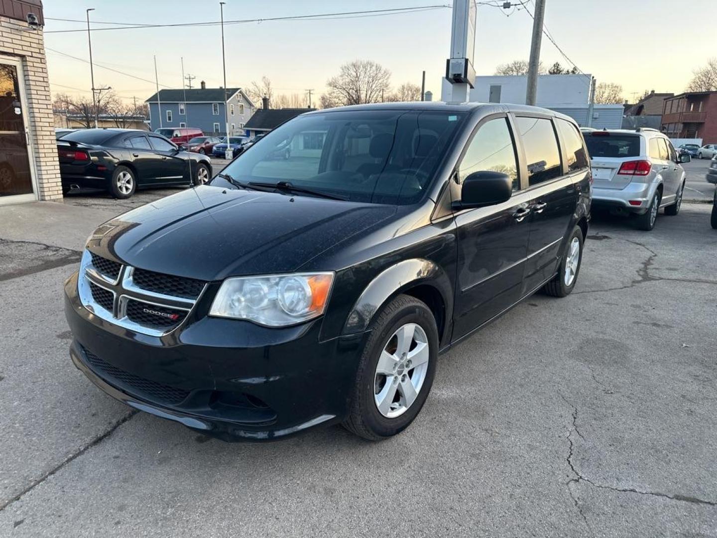 2013 BLACK DODGE GRAND CARAVAN SE (2C4RDGBG9DR) with an 3.6L engine, Automatic transmission, located at 1708 Broadway, Rockford, IL, 61104, (815) 397-5010, 42.252522, -89.069359 - Photo#0