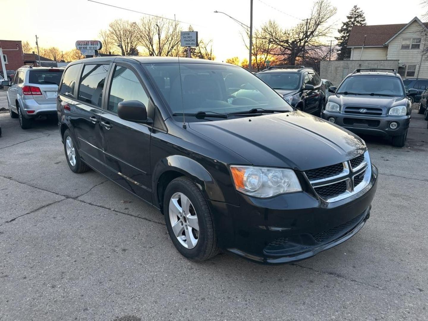 2013 BLACK DODGE GRAND CARAVAN SE (2C4RDGBG9DR) with an 3.6L engine, Automatic transmission, located at 1708 Broadway, Rockford, IL, 61104, (815) 397-5010, 42.252522, -89.069359 - Photo#3